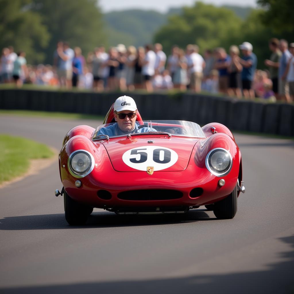 Porsche 550 Spyder auf der Rennstrecke in Aktion.