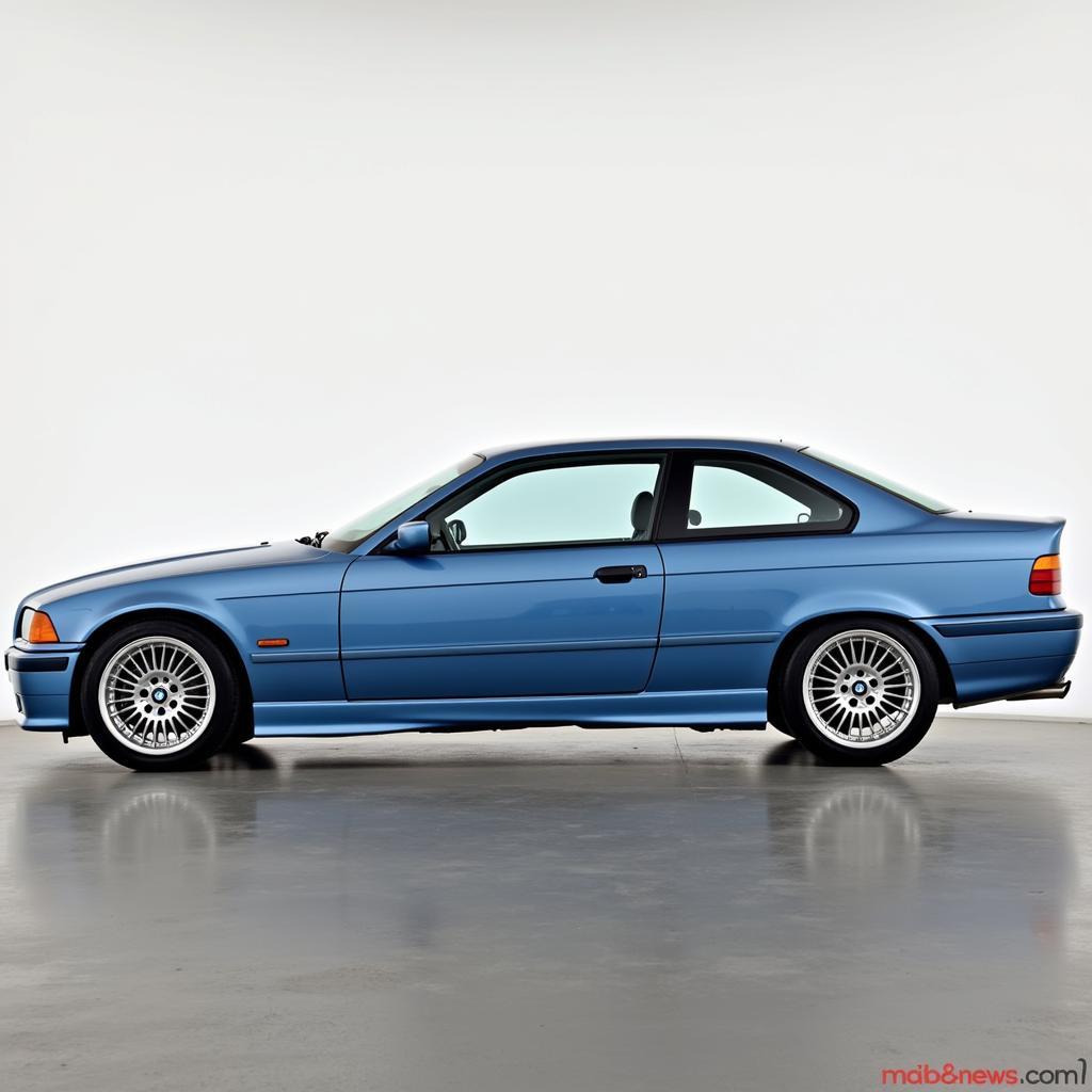 BMW 3er E36 Coupé in Estorilblau von der Seite