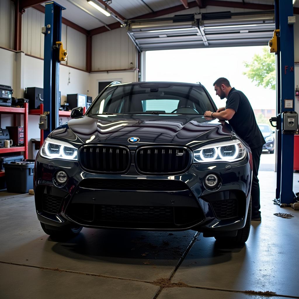 BMW X5 M50d Werkstatt Reparatur